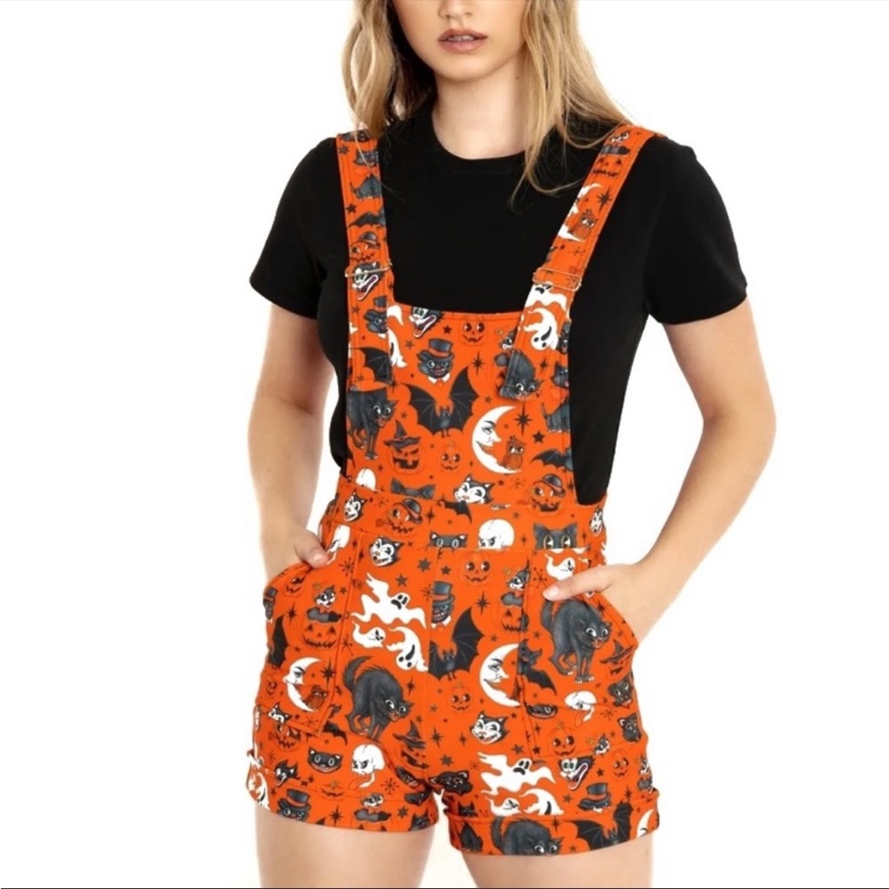 Orange vintage Halloween black milk overalls new with tags. Size large.